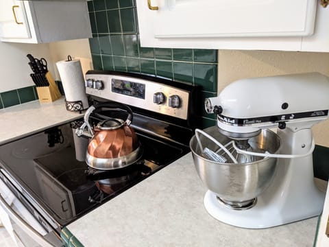 Our kitchen has many kitchen appliances such as a KitchenAid Mixer, Keurig&more.