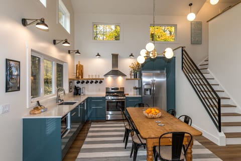 The eat-in kitchen has a table with seats for 6 to 8