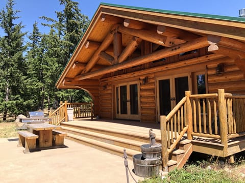 In the warmer months, enjoy the west facing deck and wood table!  