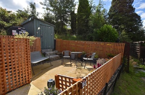 Patio with shed available for guest use