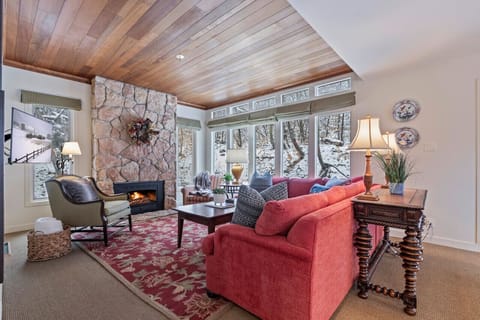 Cozy up and watch the snow fall in our family room that feels like a snow globe with all the windows