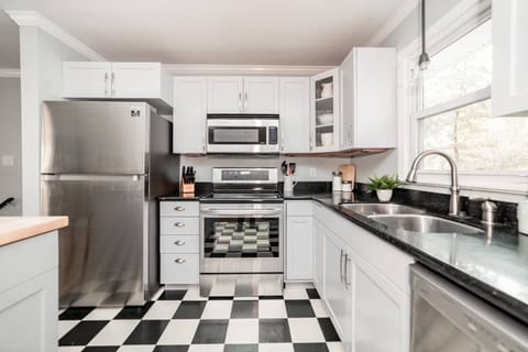 Kitchen is stocked with essentials for cooking meals.