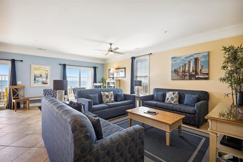Comfy sofas provide a place to relax and enjoy a family movie night.