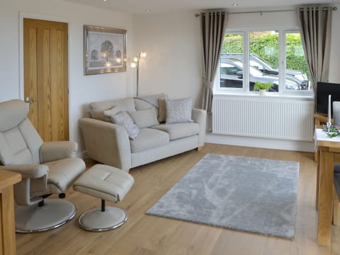 Comfortable seating within living area | Seabreeze, Walcott