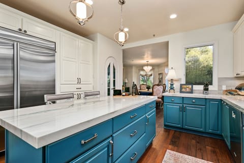 Kitchen with dining for 6-8 adjoins. Professional appliances, cookware, dishes.