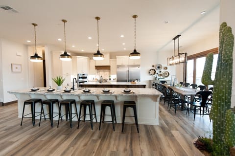 Grand kitchen includes 2 separate islands - each with sink and dishwasher