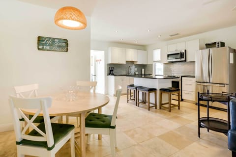 Dining Area | Dishware & Flatware Provided | Breakfast Bar w/ Additional Seating