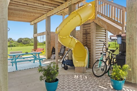 Kid's slide & 3 swings, ping pong,  basketball and pickle ball all under house