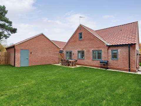 Lawned garden area with patio | Seasalt, Mundesley, near North Walsham