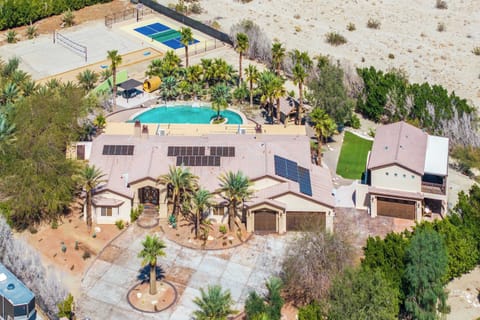 Welcome to Jack Estate This luxurious retreat features resort-style amenities, including a stunning pool, private putting green, beach volleyball court, pickleball and basketball court, golf simulator, sauna & more. Experience the ultimate getaway.