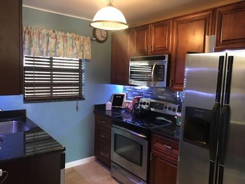 New kitchen just completed Jan, '20 - all wood cabinets, granite countertops.