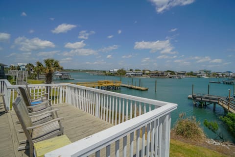 Step onto your private waterfront deck where inlet waters and peaceful marina views create the perfect backdrop for morning coffee or sunset relaxation.