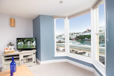 Large bay window in the lounge with stunning sea views
