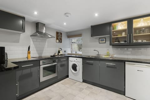 Newly decorated kitchen, including ceramic hob, oven, microwave, washer dryer, fridge and dishwasher.