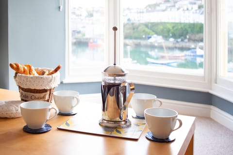 Enjoy breakfast every morning looking out onto the harbour.