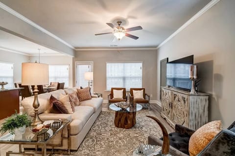 The living room and window with a view directly to the lake & open deck