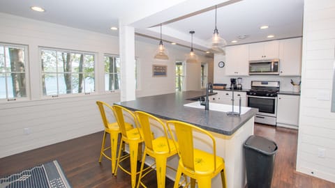 Cottage-style kitchen and dining area ideal for summer gatherings.