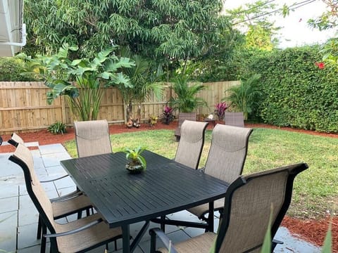 Relax in the private back yard.  Enjoy the new grill or order in! I know I have to put up a new picture, the New white vinyl privacy fence, landscaping and New Hot Tub Spa take up the corner of the back yard.  You will love it!  