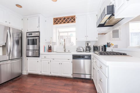 The kitchen comes stocked with dishes, utensils, cookware, bakeware, and large & small appliances. Guests must provide their own food, drink, spices, and condiments.
                