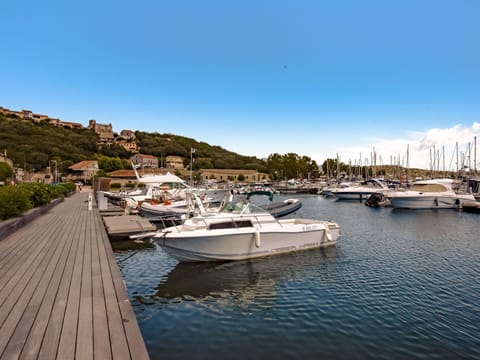 Water, Boat, Sky, Watercraft, Cloud, Vehicle, Lake, Tree, Bank, Building