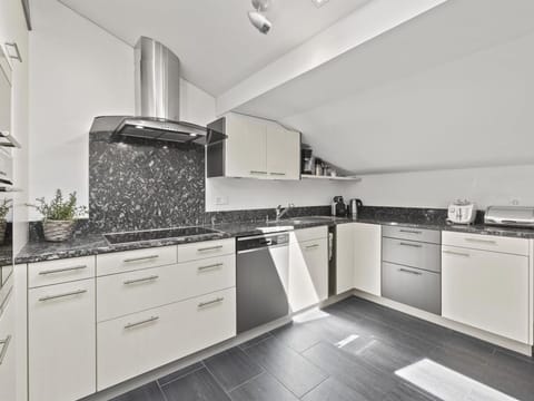 Countertop, Cabinetry, Property, Kitchen Stove, Kitchen Appliance, Kitchen, Building, Home Appliance, Cooktop, Stove