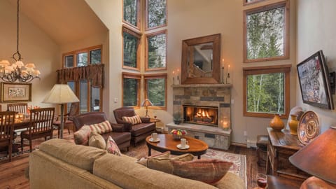 Welcome to Chalet Punto! Enjoy the inviting fireplace.