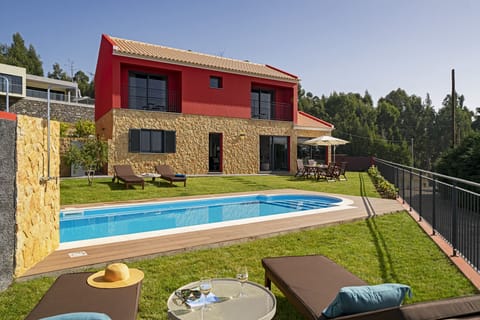 swimming pool and view to the property
