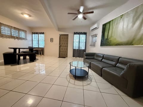 Roomy  with living room, dining and work station areas.