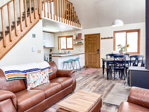 The great room has a dining area and it goes right into the kitchen. A great place to enjoy the mountains!