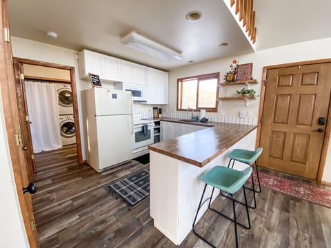 Pull up a seat and have a conversation at the kitchen peninsula