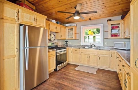 Well equiped kitchen with large refrigerator and ample counter space.