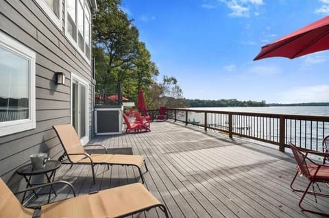 Huge deck right on the water with ample seating and lounging areas.