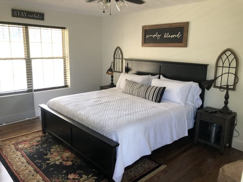 Master Bedroom with King Bed, flatscreen TV and in suite bathroom.