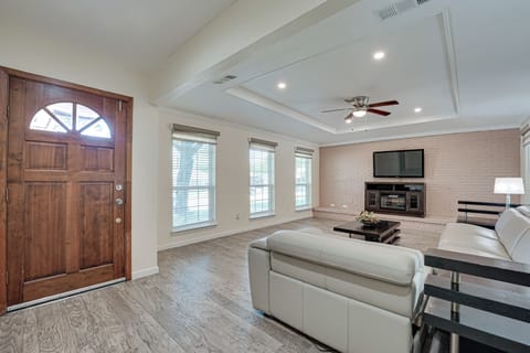Living Area with Leather Sofas and Recliner and 65" TV with over 400 channels 