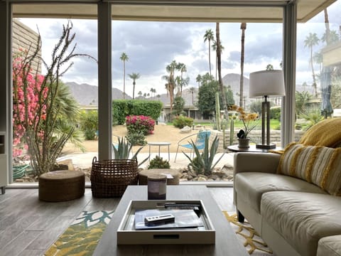 View from living room and dining room. Nice year round. Blinds can go down