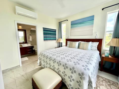 Sink into the embrace of the sumptuous king-sized bed, adorned with the finest linens, and let the rhythmic melody of the ocean waves lull you into a serene slumber.