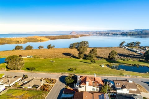 This wonderful home is located in Los Osos and features views of the golf course and Bay