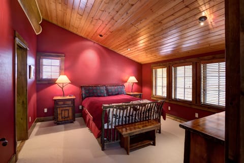 Sink into a serene retreat with warm lighting and rich colors.