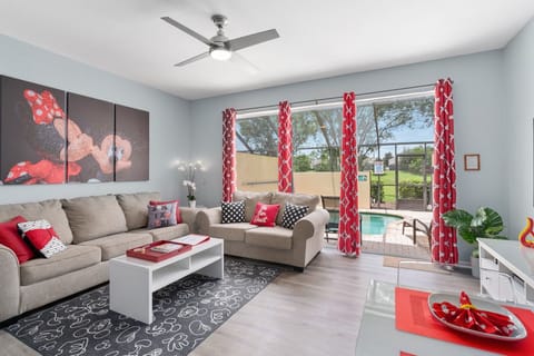 Open view format with plenty of comfortable seating. Enjoy the pool and lanai scenery along with view of the green garden!