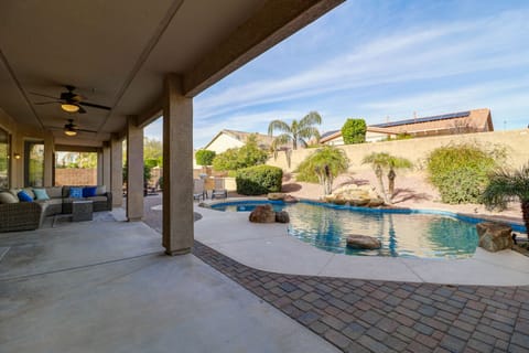 Pool with waterfall and Backyard