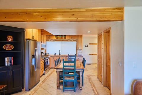 Modern, open kitchen with communal table!