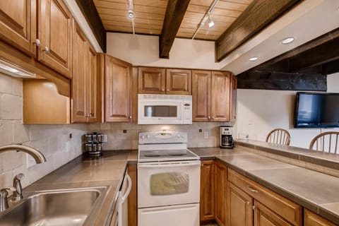 microwave, stove, coffee pot