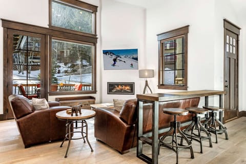 Curl up on the sofa to warm up in front of the gas fireplace and relax with a movie on the flat screen TV.