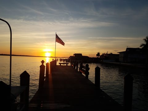 Inn Villas pier with Snook Inn in background 