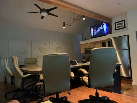 Life happens in the kitchen. This one has a big screen, reclining leather chairs