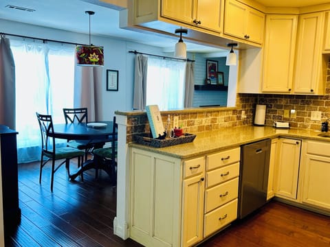 Kitchen opens to dining area