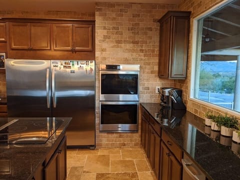 The kitchen has double convection ovens.