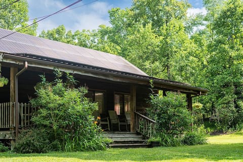 The Meadows Cabin
View of the back porch with rocking chairs.