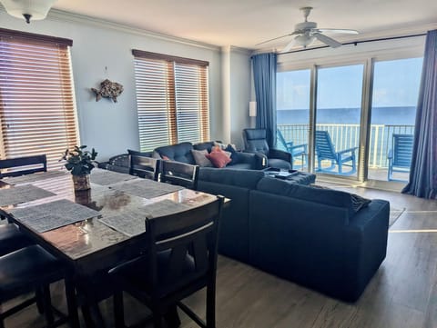 Step into your bright, open living space where ocean breezes and stunning sea views greet you through floor-to-ceiling glass doors. Unwind on plush sofas or step onto your private balcony to soak in the endless horizon.