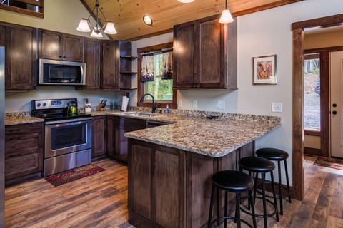 The kitchen is just a few steps in from the front door.